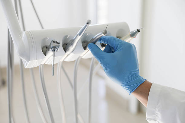 Professional Wisdom Tooth Removal technician working in Creve Coeur, MO